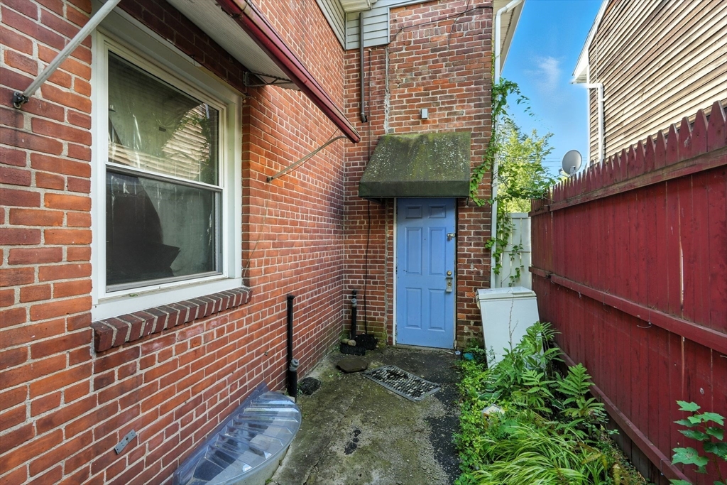 222-224 Main Street Springfield, MA 01151 - Photo 35 of 42 a front view of a house with a yard