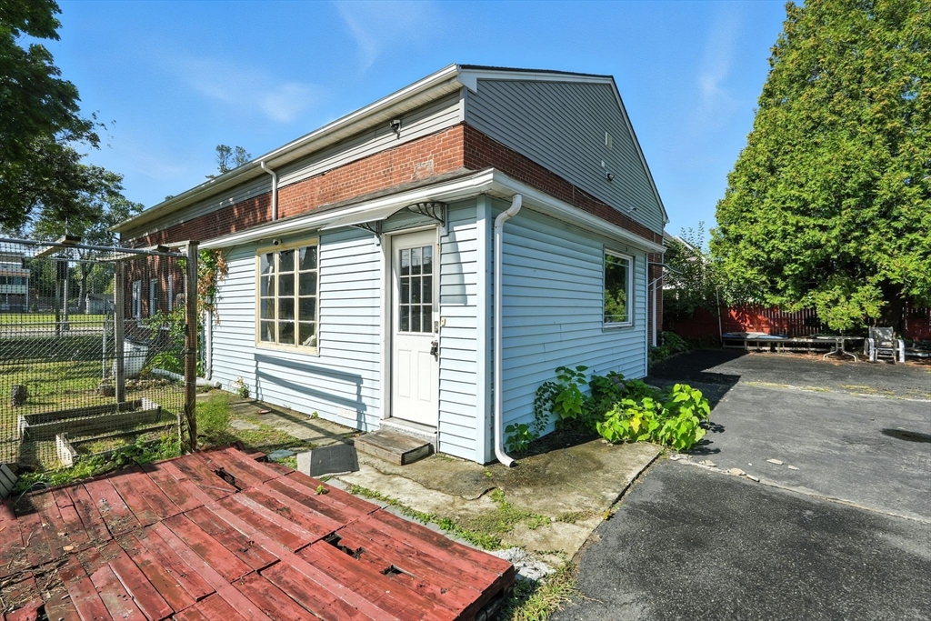 222-224 Main Street Springfield, MA 01151 - Photo 36 of 42 a front view of a house with a yard