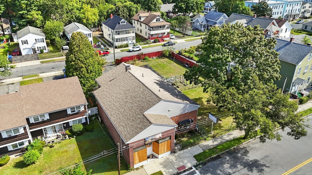 222-224 Main Street Springfield, MA 01151 - Photo 37 of 42 an aerial view of a house with a yard and lake view