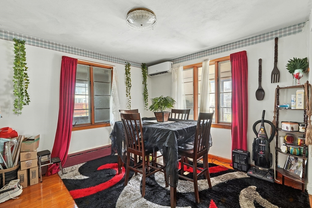 222-224 Main Street Springfield, MA 01151 - Photo 4 of 42 a view of a dining room with furniture window and wooden floor