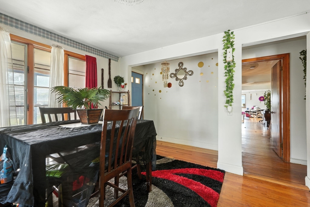 222-224 Main Street Springfield, MA 01151 - Photo 5 of 42 a living room with furniture and wooden floor