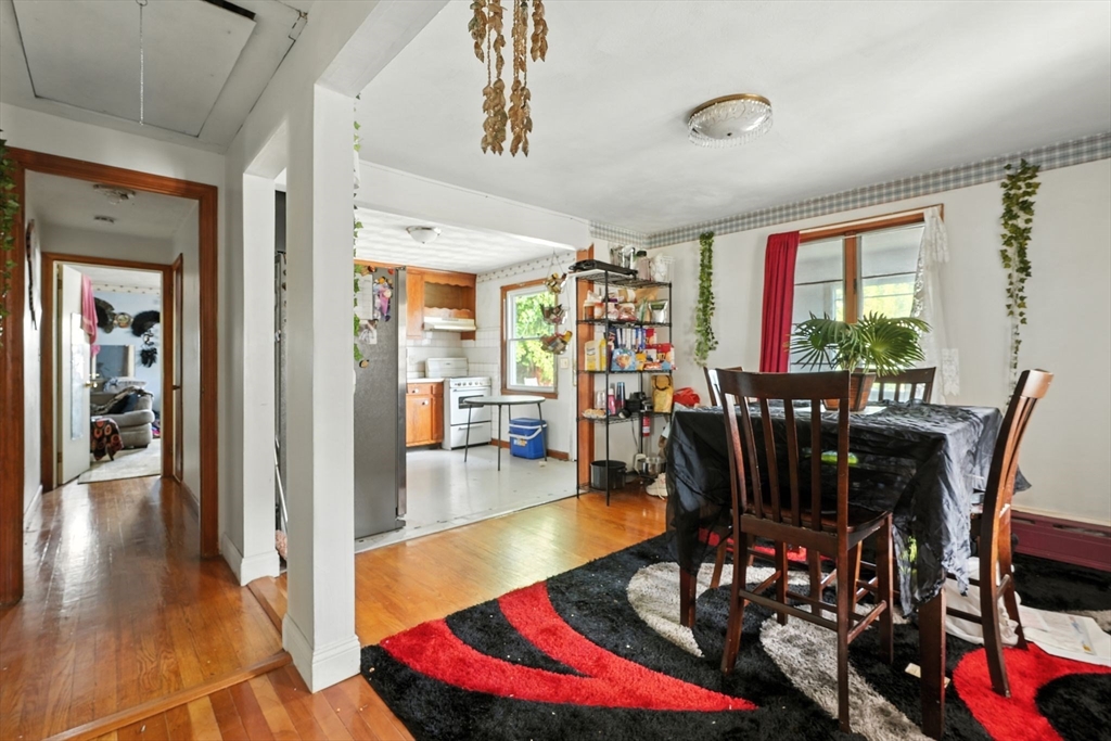 222-224 Main Street Springfield, MA 01151 - Photo 6 of 42 a view of a dining room with furniture window and wooden floor