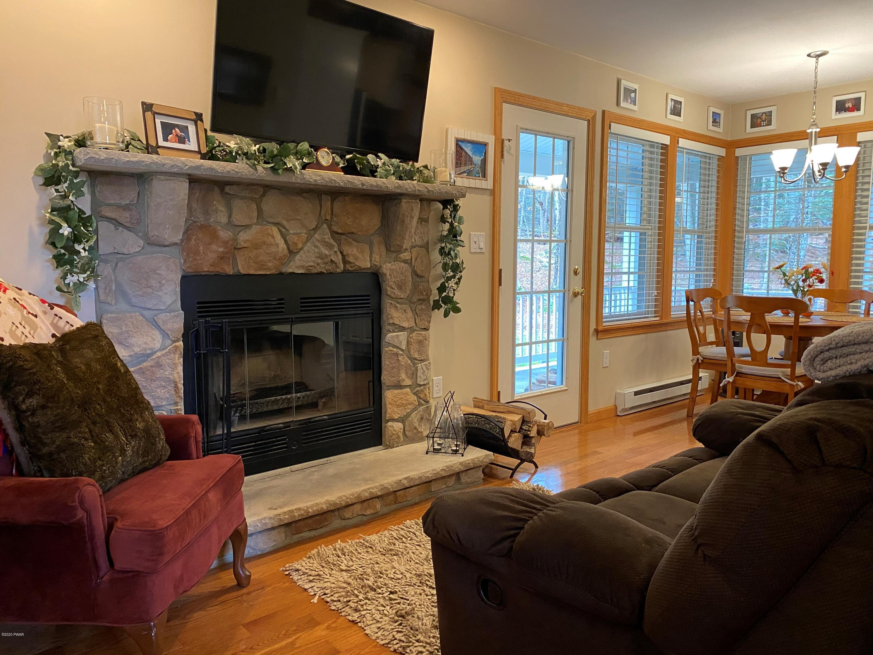 122 Well Road Greentown, PA 18426 - Photo 3 of 26 Cozy living area with Fireplace