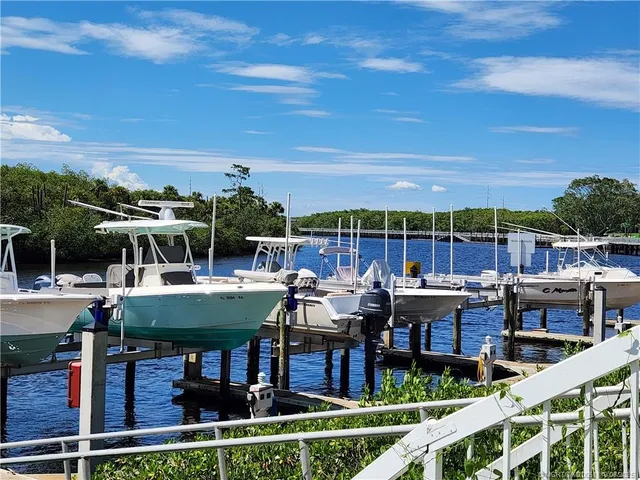 a view of a patio with couches chairs dining table and chairs