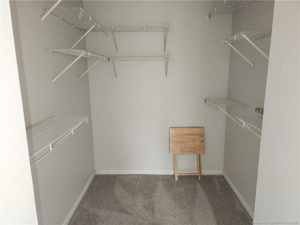 2502 Southeast Anchorage Cove, Unit H2 Port St. Lucie, FL 34952 - Photo 20 of 37 a view of an empty room