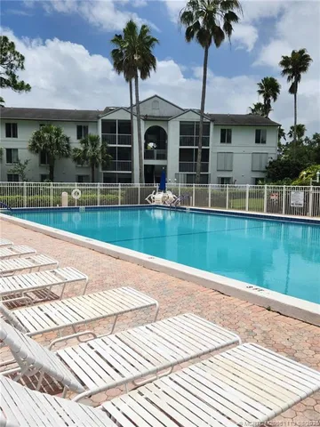 a view of a house with a swimming pool
