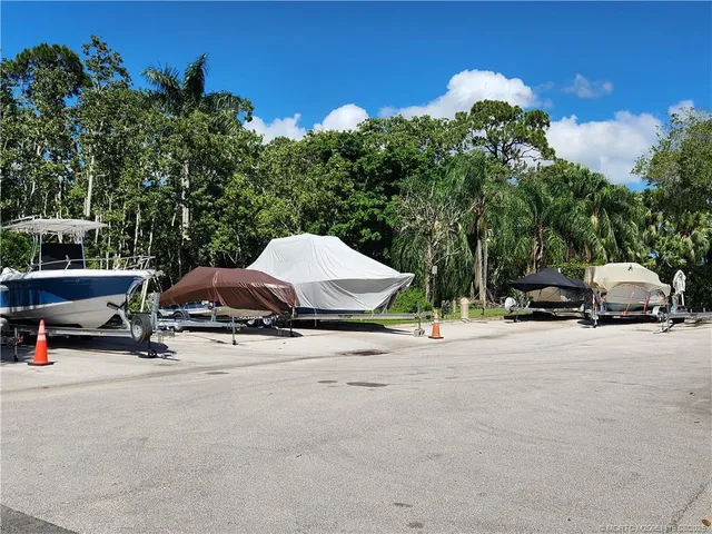 a sign on the side of the tree