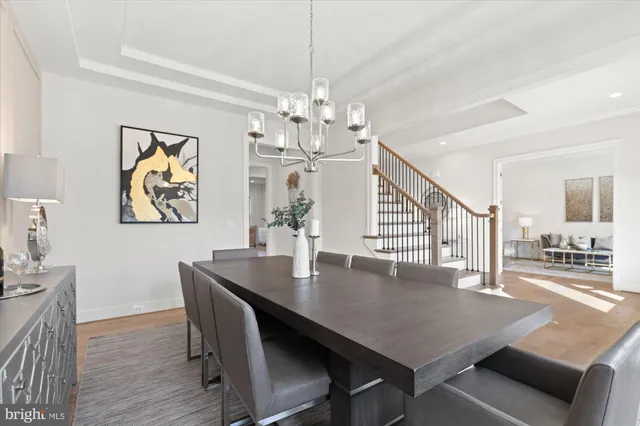 a view of a hallway with chandelier