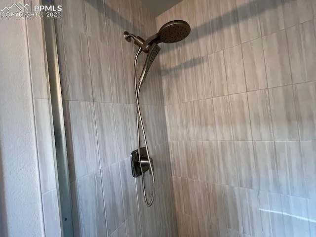 a view of a balcony with wooden floor