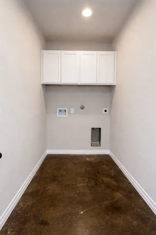 an empty room with kitchen