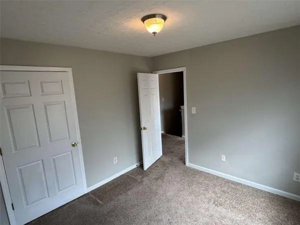 an empty room with a door