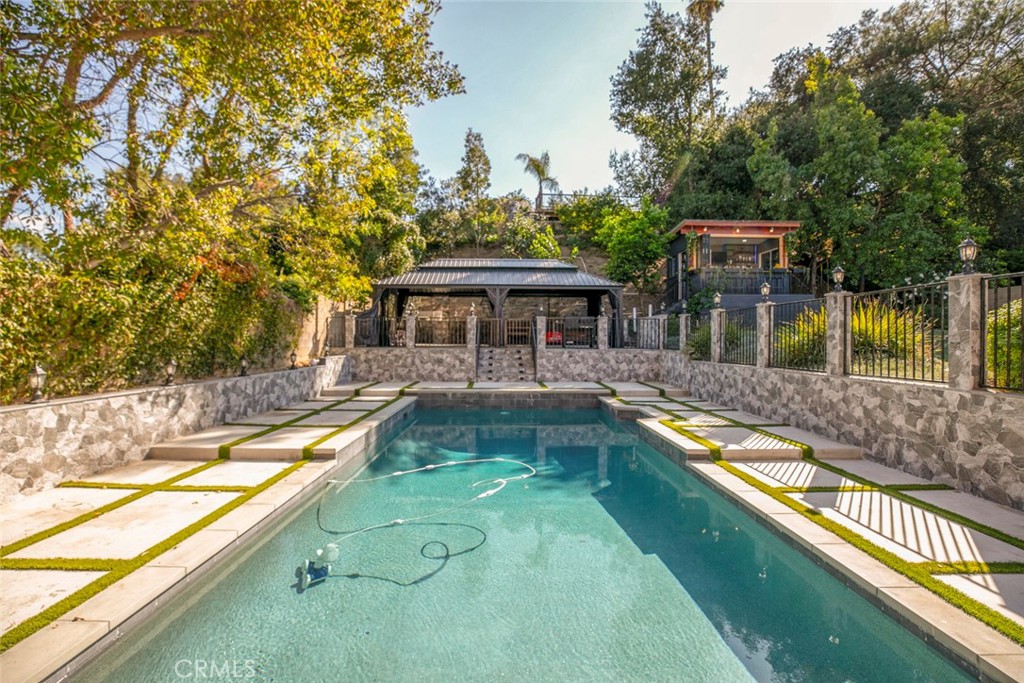 18810 Kirkcolm Lane Porter Ranch, CA 91326 - Photo 42 of 75 swimming pool view with a seating space