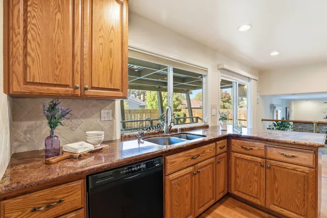 a kitchen with a sink and a window