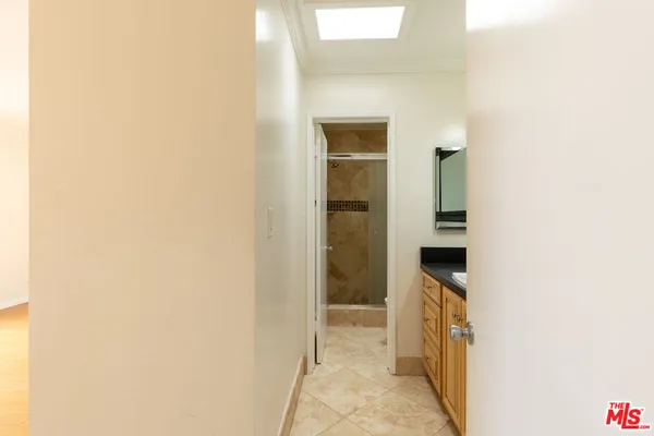 a bathroom with a sink a vanity and a mirror