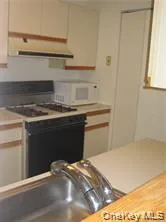a view of a kitchen with washing machine