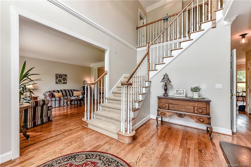 325 Kimberly Road Davidson, NC 28036 - Photo 2 of 22 a view of entryway and hall with wooden floor