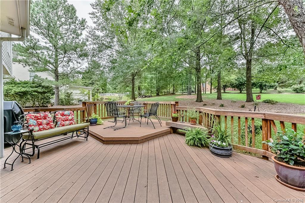 325 Kimberly Road Davidson, NC 28036 - Photo 19 of 22 a view of a chairs and tables in the balcony