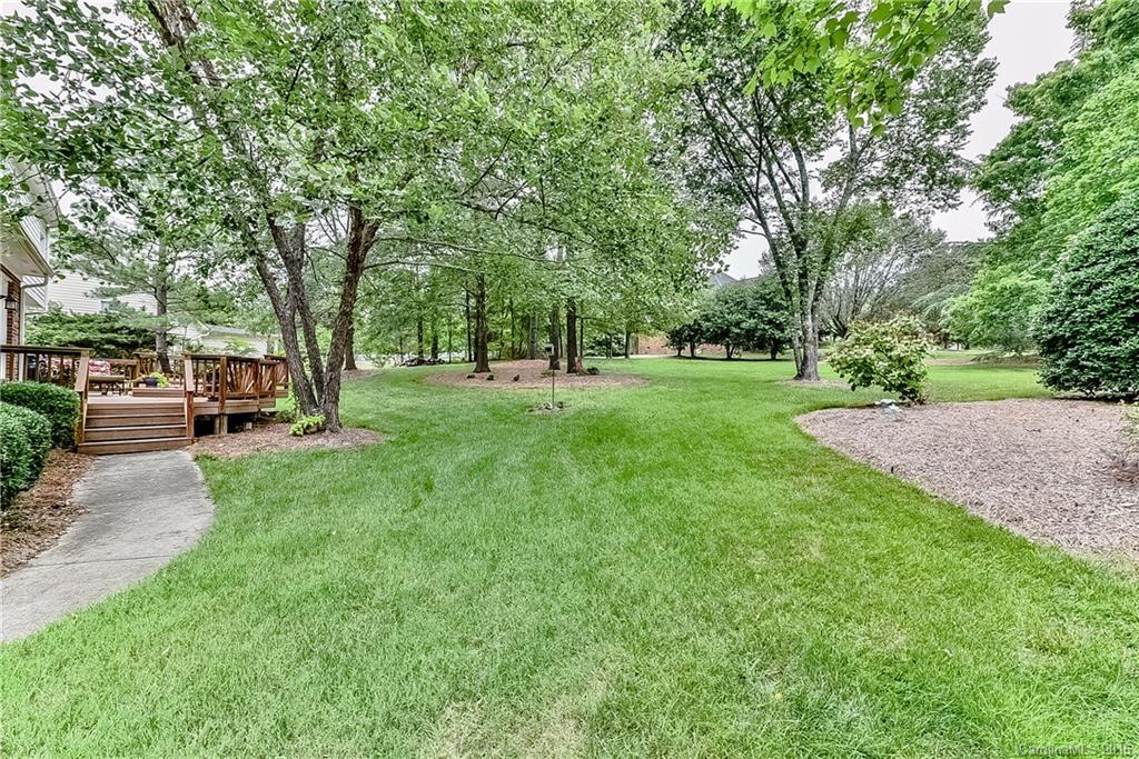 325 Kimberly Road Davidson, NC 28036 - Photo 20 of 22 a view of a park with trees and cars