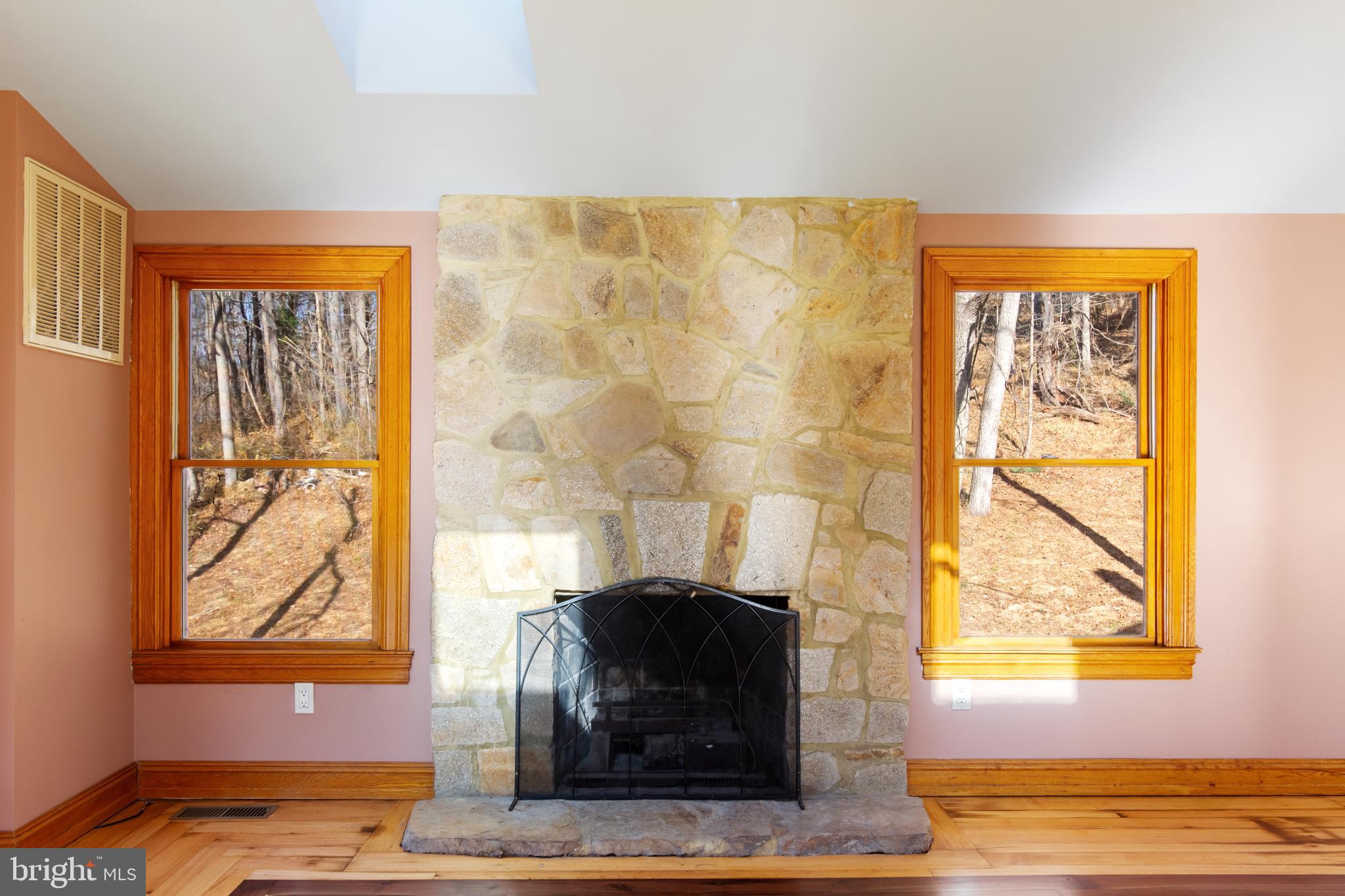 4100 Simpson Drive Westminster, MD 21158 - Photo 16 of 52 a living room with a wooden floor and a table
