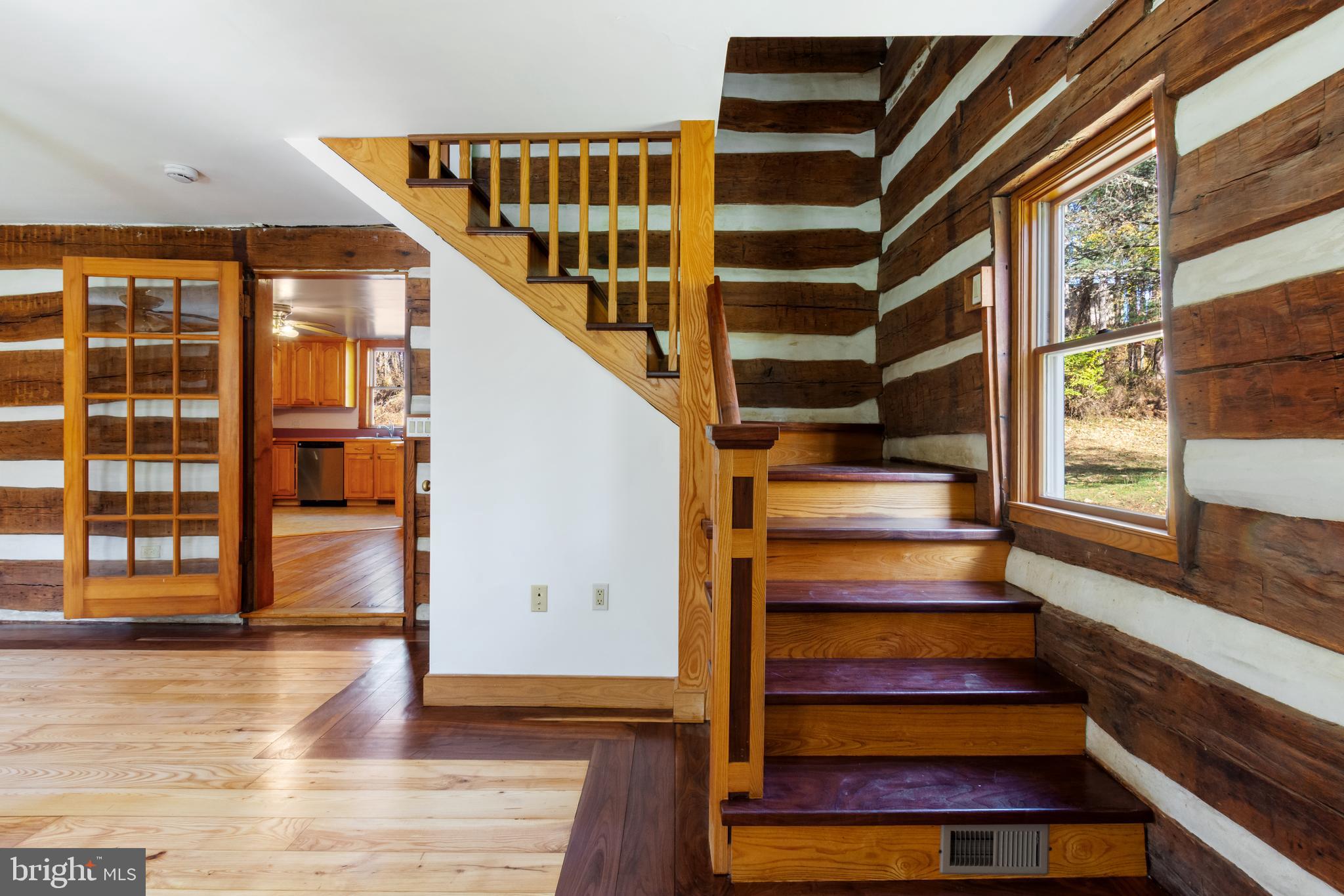 4100 Simpson Drive Westminster, MD 21158 - Photo 20 of 52 a view of entryway with wooden floor and windows