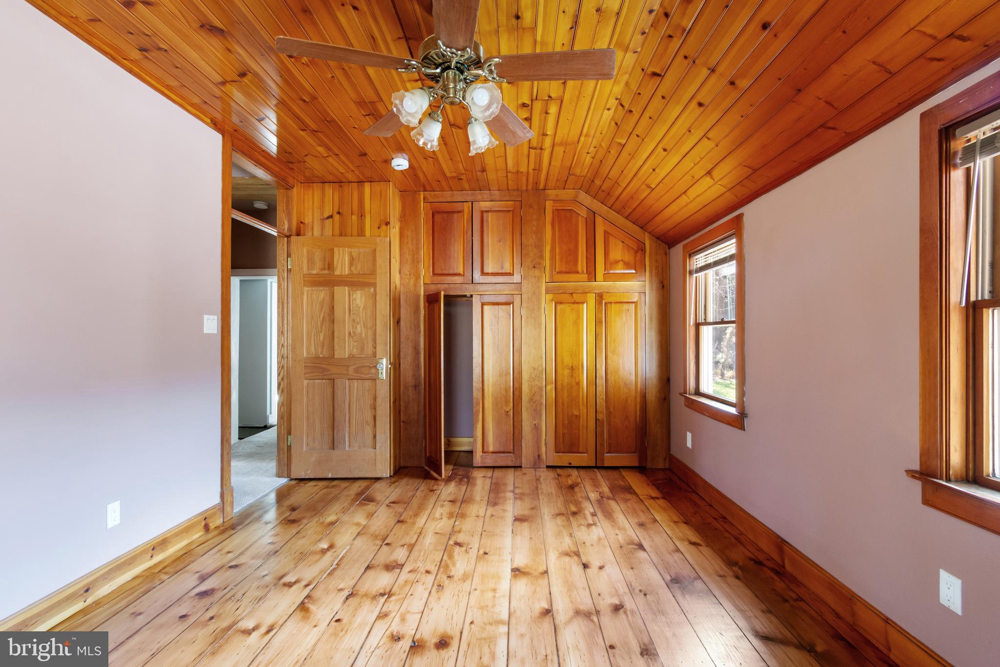 4100 Simpson Drive Westminster, MD 21158 - Photo 31 of 52 a view of a room with wooden floor and windows