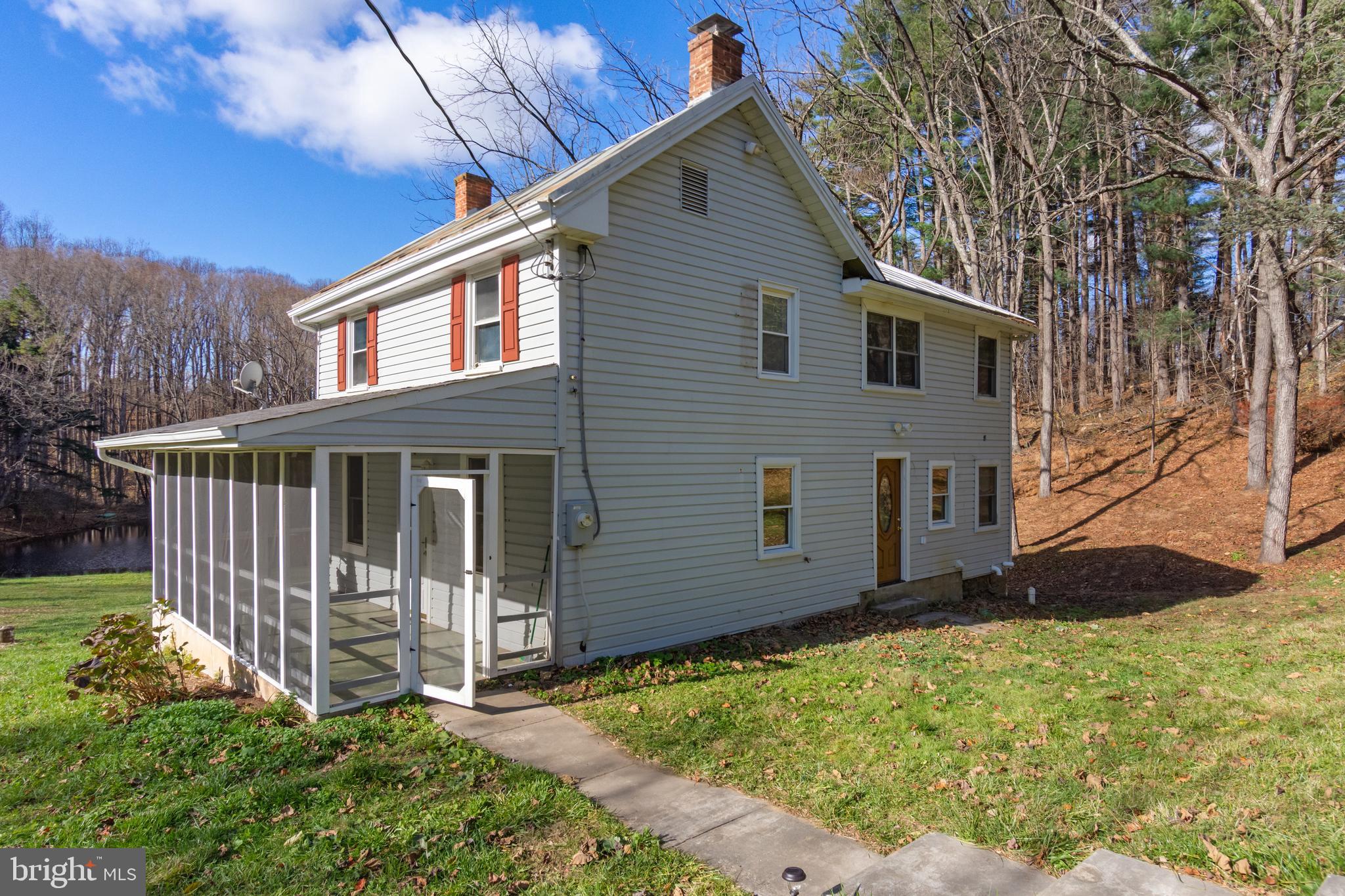 4100 Simpson Drive Westminster, MD 21158 - Photo 37 of 52 a backyard of a house with lots of green space