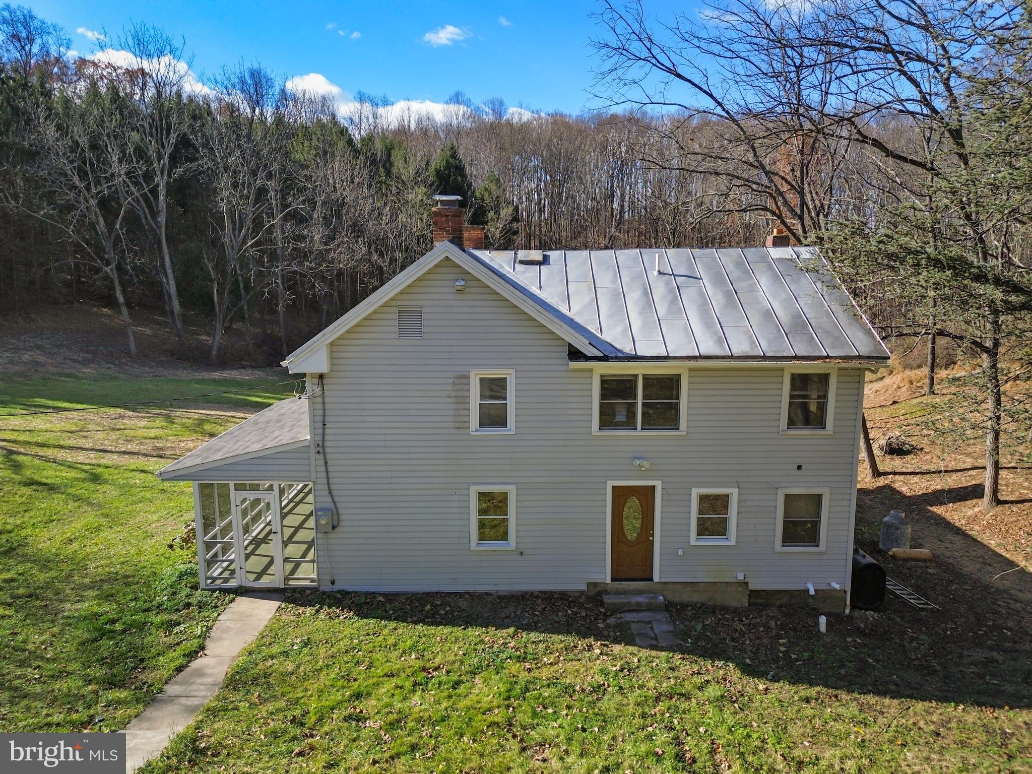 4100 Simpson Drive Westminster, MD 21158 - Photo 39 of 52 a view of a house with a yard