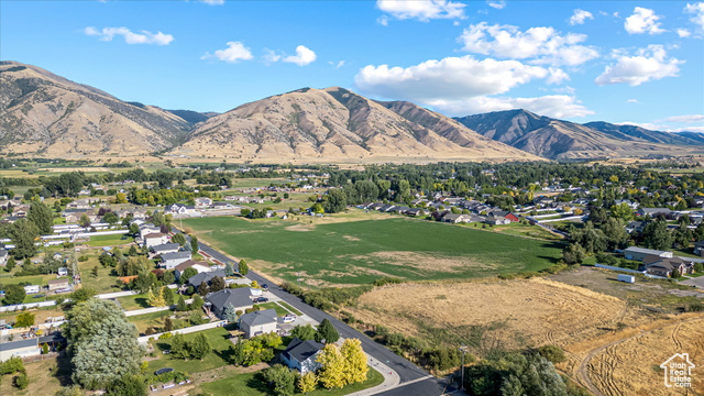 294 West 3400 South, Unit 9 Logan, UT 84321 - Photo 5 of 24 View of mountain background with nearby suburban area