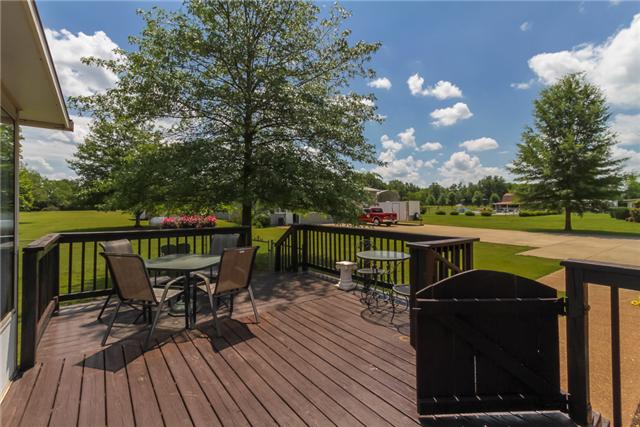 3858 Leanna Road Murfreesboro, TN 37129 - Photo 14 of 20 The deck on this home is beautiful! It features a dark stain, a gate, enough area for a table, seating area and a grill! Murfreesboro, TN 37129