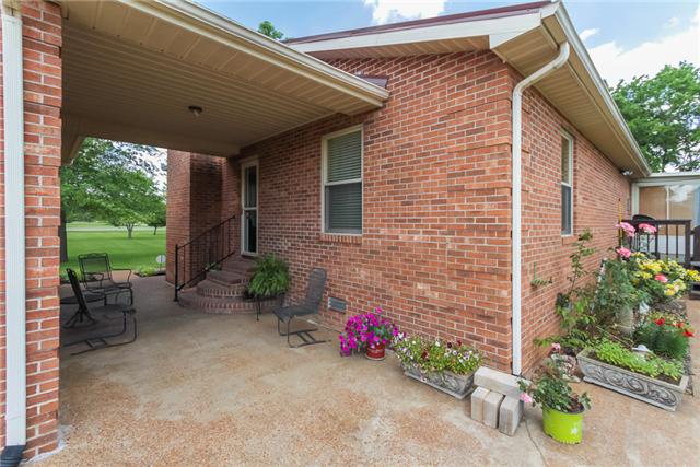 3858 Leanna Road Murfreesboro, TN 37129 - Photo 16 of 20 The 2 car bricked garage is not technically attached to the home but it does have this covered breezeway which makes a pretty feature to the home!!Murfreesboro, TN 37129