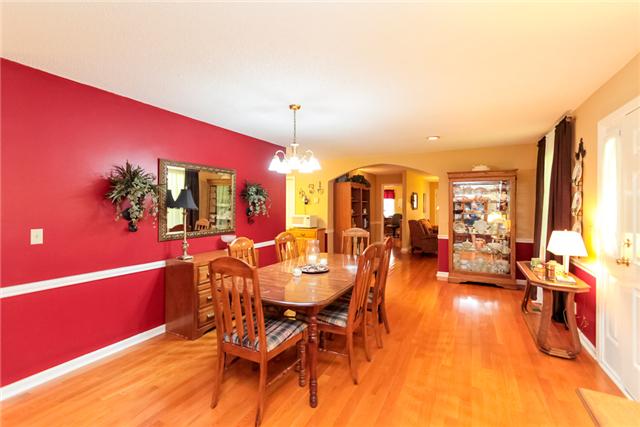 3858 Leanna Road Murfreesboro, TN 37129 - Photo 9 of 20 The dining room is huge!! It features beautiful hardwood floors, a lot of open wall space that can hold a large china hutch or buffett, an arched doorway and lots of natural light! Murfreesboro, TN 37129