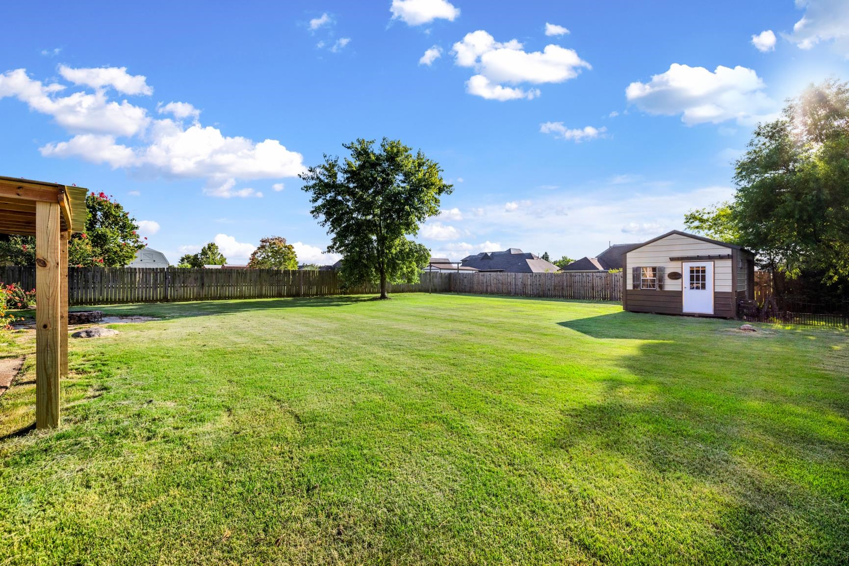 505 Terry Road Oakland, TN 38060 - Photo 40 of 40 Fenced backyard with a storage unit