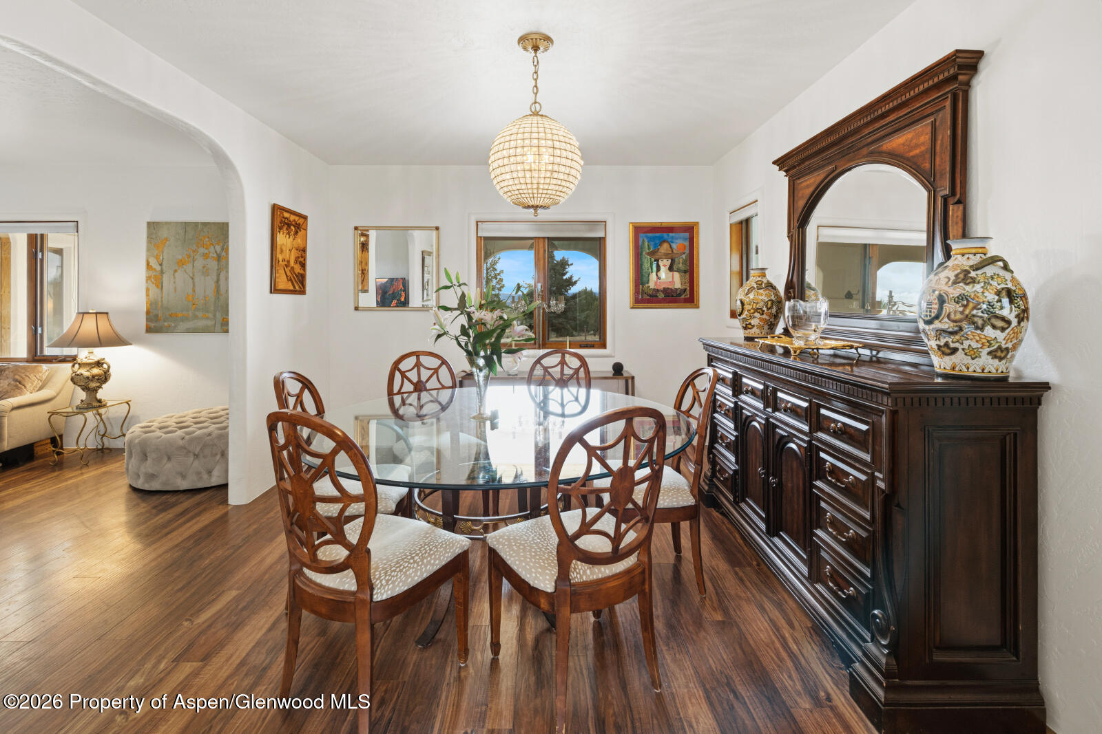1007 Mesa Drive Rifle, CO 81650 - Photo 17 of 56 a view of a dining room with furniture window and wooden floor
