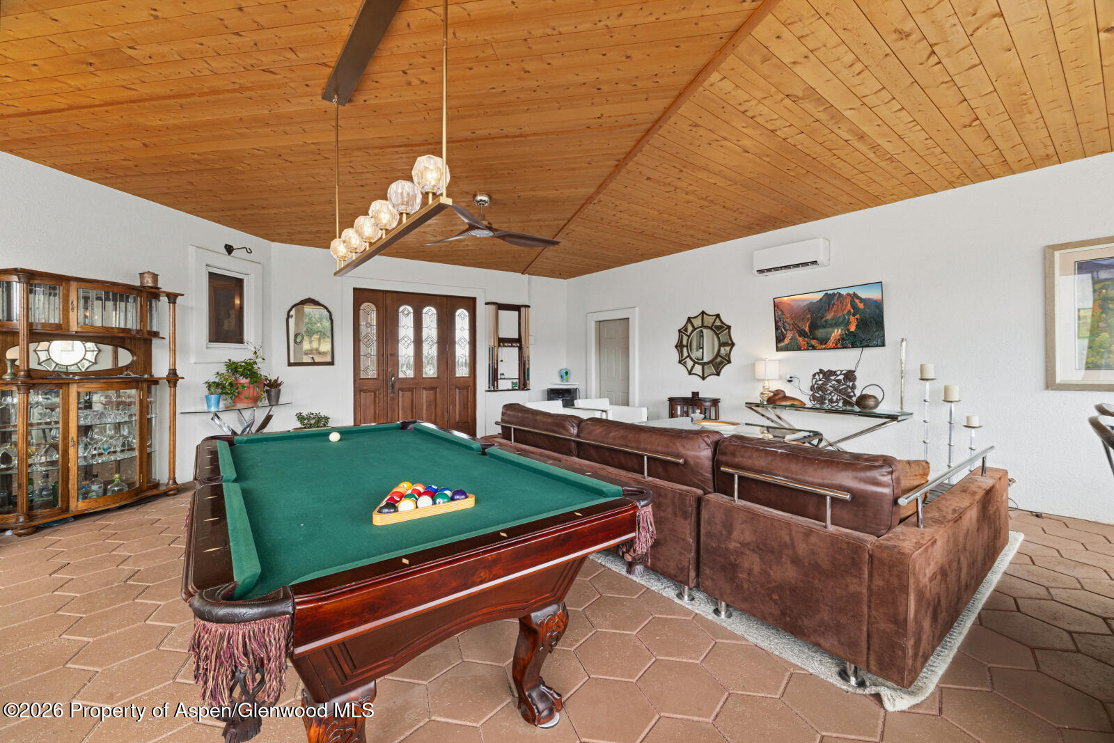 1007 Mesa Drive Rifle, CO 81650 - Photo 23 of 56 a living room with furniture pool table and chairs