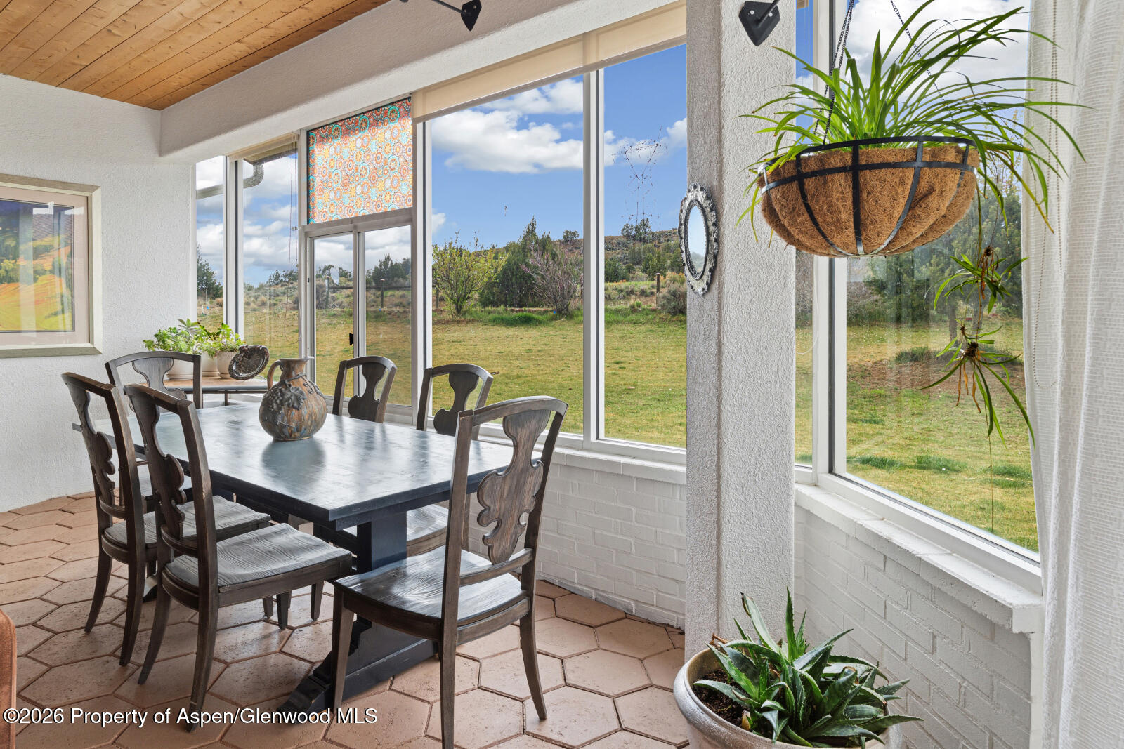 1007 Mesa Drive Rifle, CO 81650 - Photo 26 of 56 a view of a dining room with furniture window and outside view