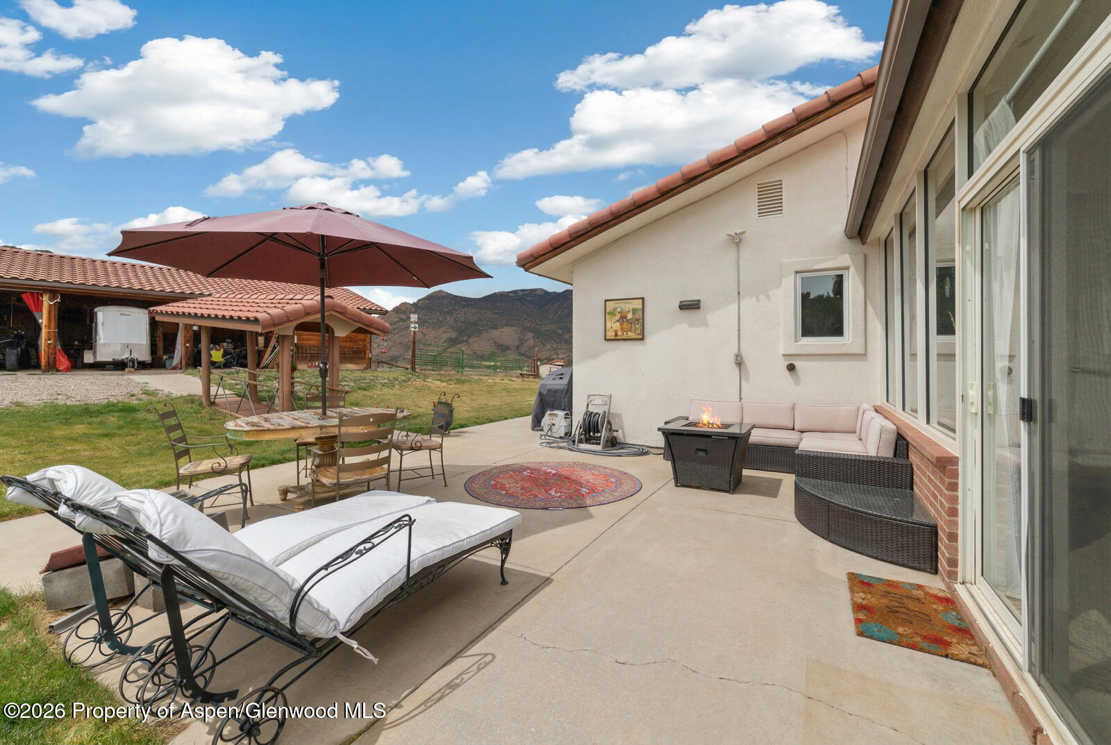 1007 Mesa Drive Rifle, CO 81650 - Photo 40 of 56 a patio with patio and garden