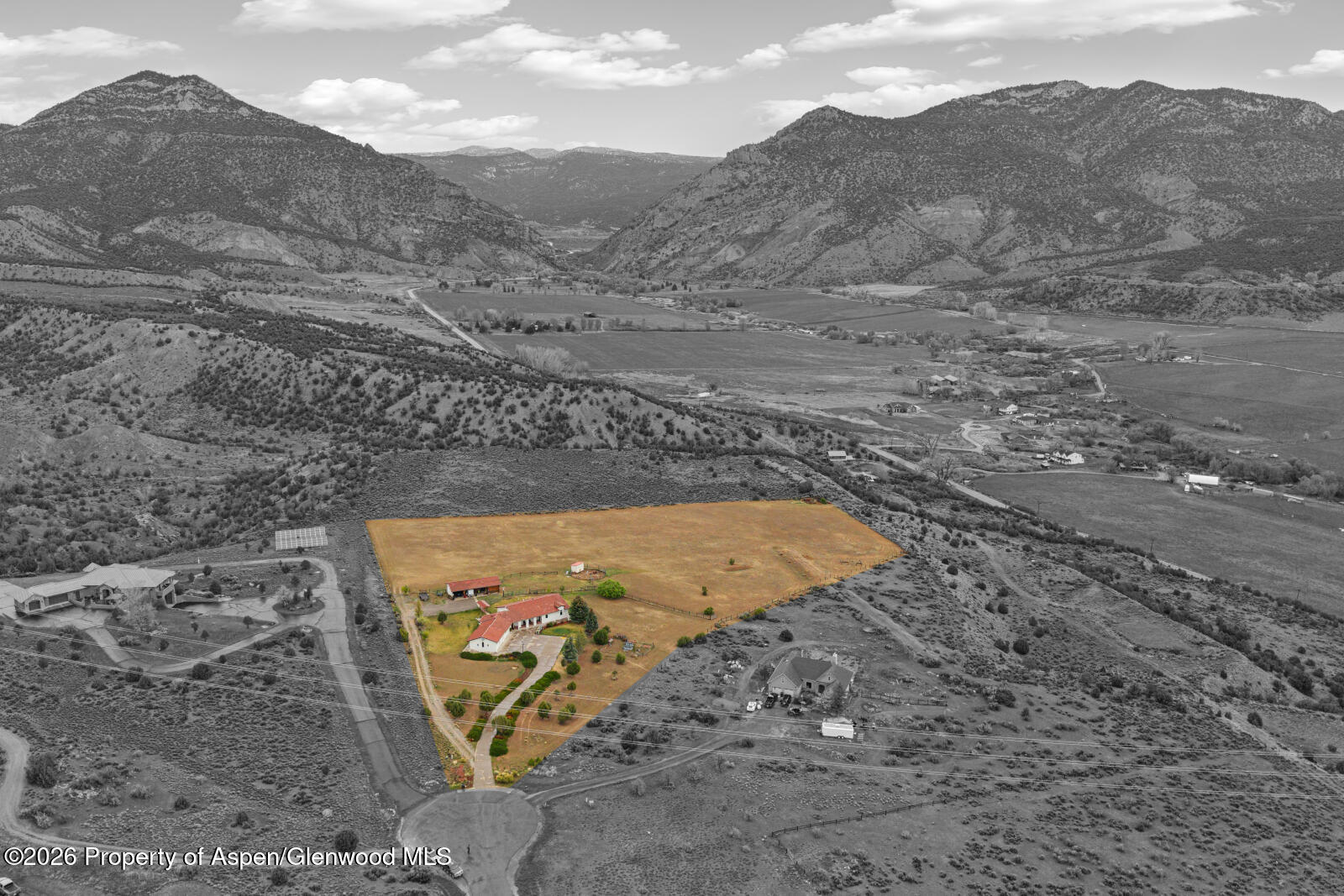 1007 Mesa Drive Rifle, CO 81650 - Photo 52 of 56 a view of a yard with mountains in the background