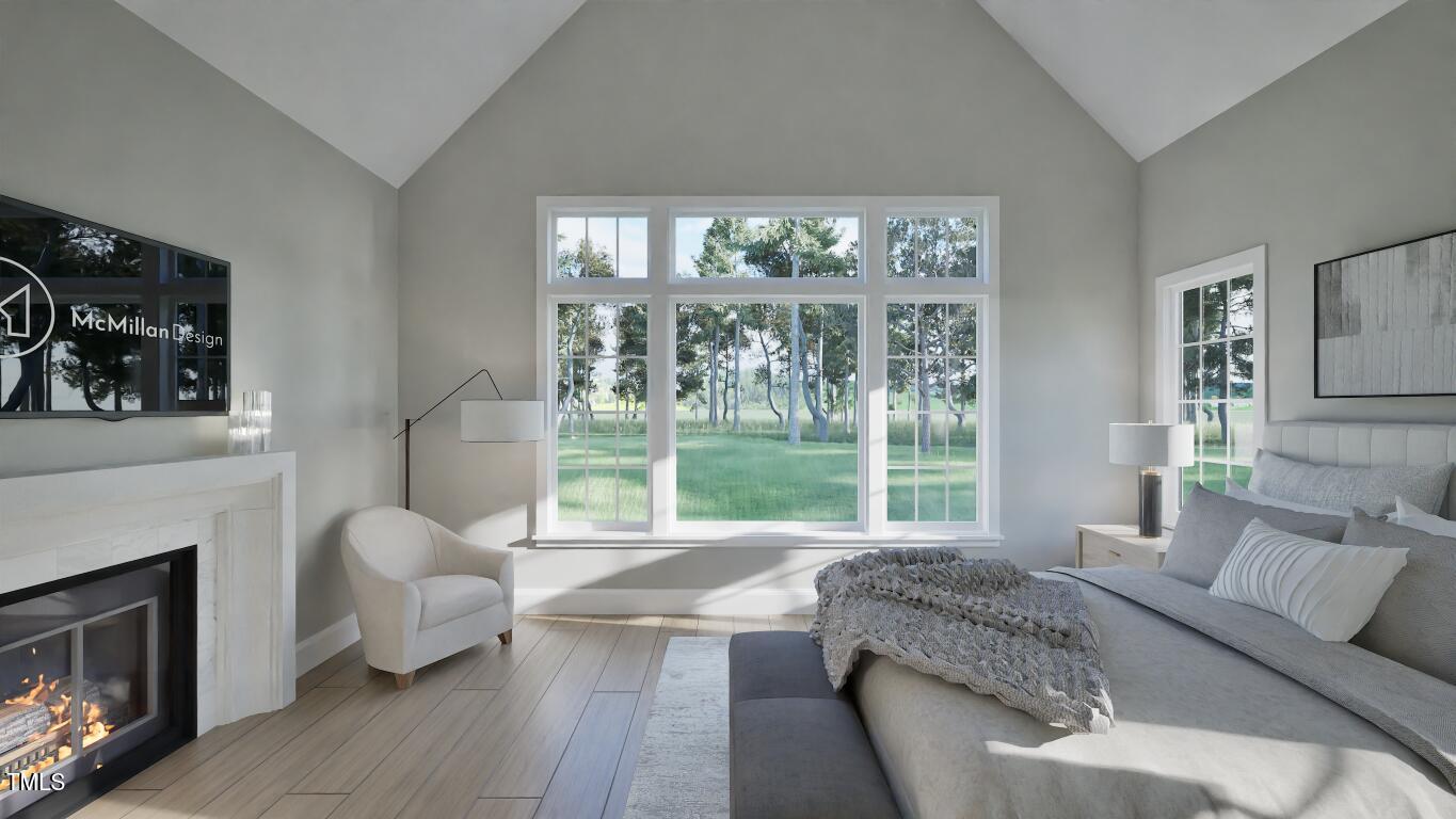 913 Tyrrell Road Raleigh, NC 27609 - Photo 13 of 42 a living room with furniture and a large window