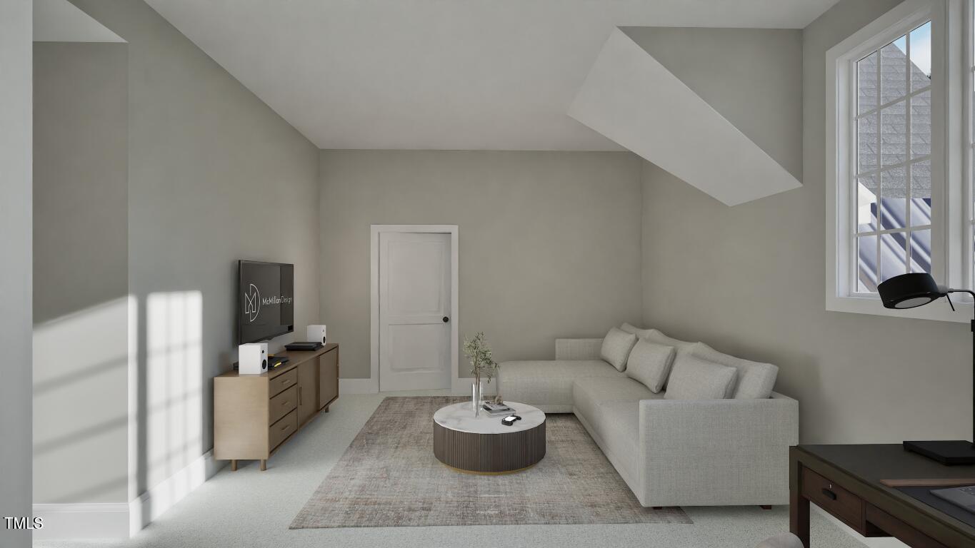 913 Tyrrell Road Raleigh, NC 27609 - Photo 21 of 42 a living room with furniture and a flat screen tv