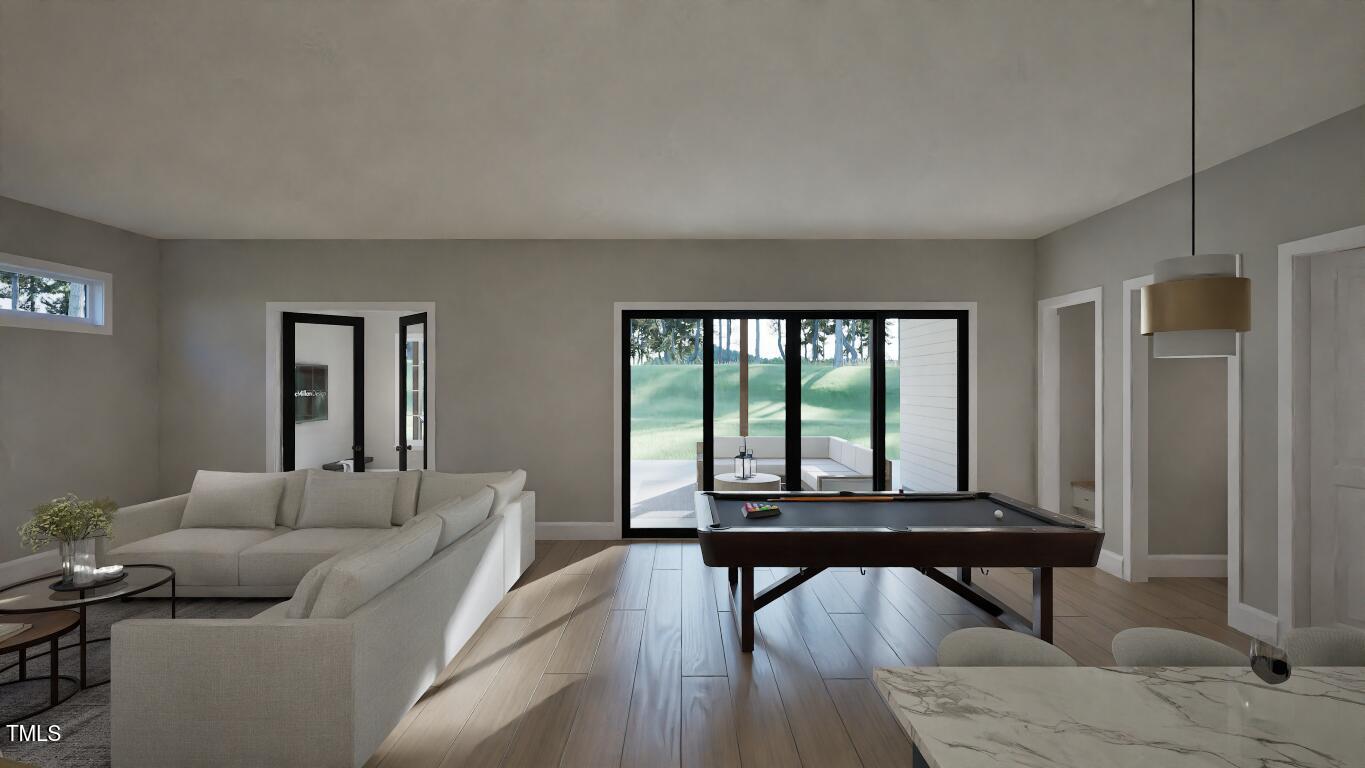 913 Tyrrell Road Raleigh, NC 27609 - Photo 22 of 42 a living room with furniture and a window