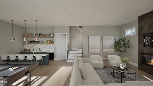 a view of a livingroom with workspace and a window