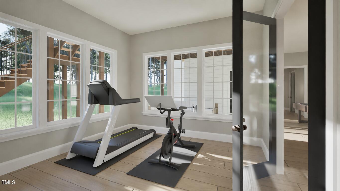 913 Tyrrell Road Raleigh, NC 27609 - Photo 27 of 42 a living room with furniture and a window
