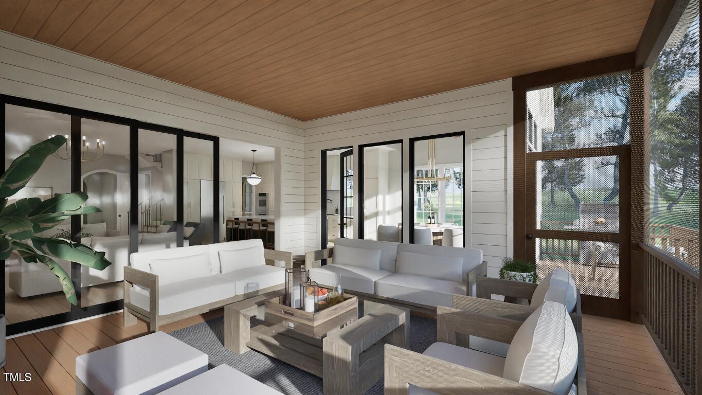 913 Tyrrell Road Raleigh, NC 27609 - Photo 30 of 42 a living room with furniture and a large window