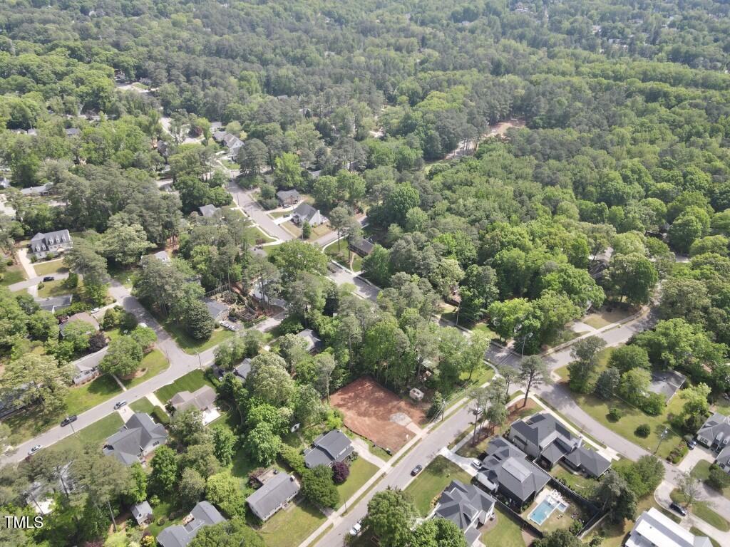 913 Tyrrell Road Raleigh, NC 27609 - Photo 40 of 42 an aerial view of residential houses with outdoor space