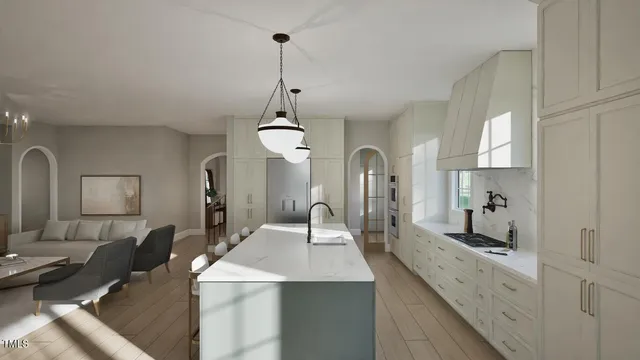 a kitchen with a sink dishwasher a dining table and chairs with wooden floor