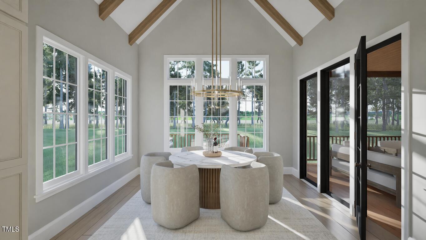 913 Tyrrell Road Raleigh, NC 27609 - Photo 6 of 42 a dining room with furniture and window