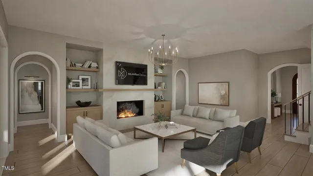 a living room with furniture fireplace and flat screen tv