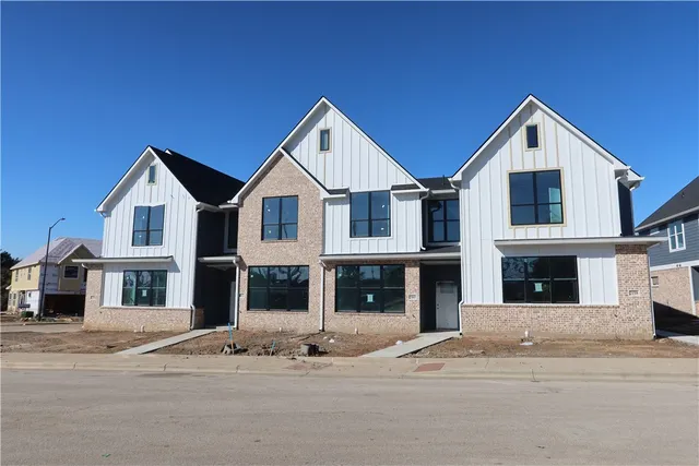 a front view of residential houses