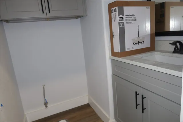 a view of small space with wooden floor