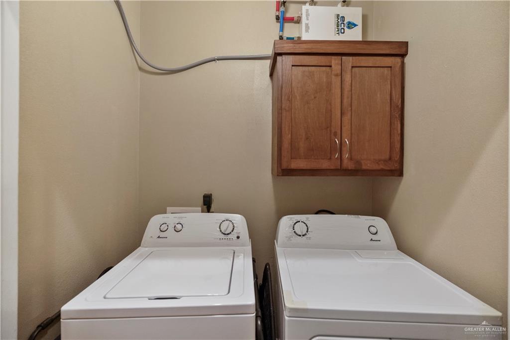 2715 Mimosa Street, Unit 9 Mission, TX 78574 - Photo 11 of 21 a utility room with dryer and washer